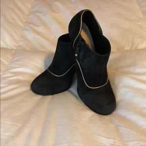 Black & gold suede booties by Rockport